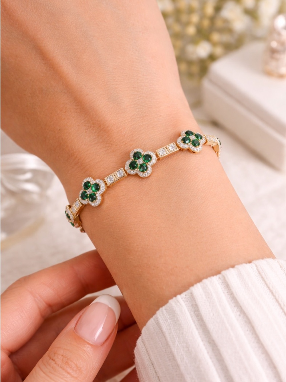 Gold-Plated Bracelet with Emerald Green Flower Accents